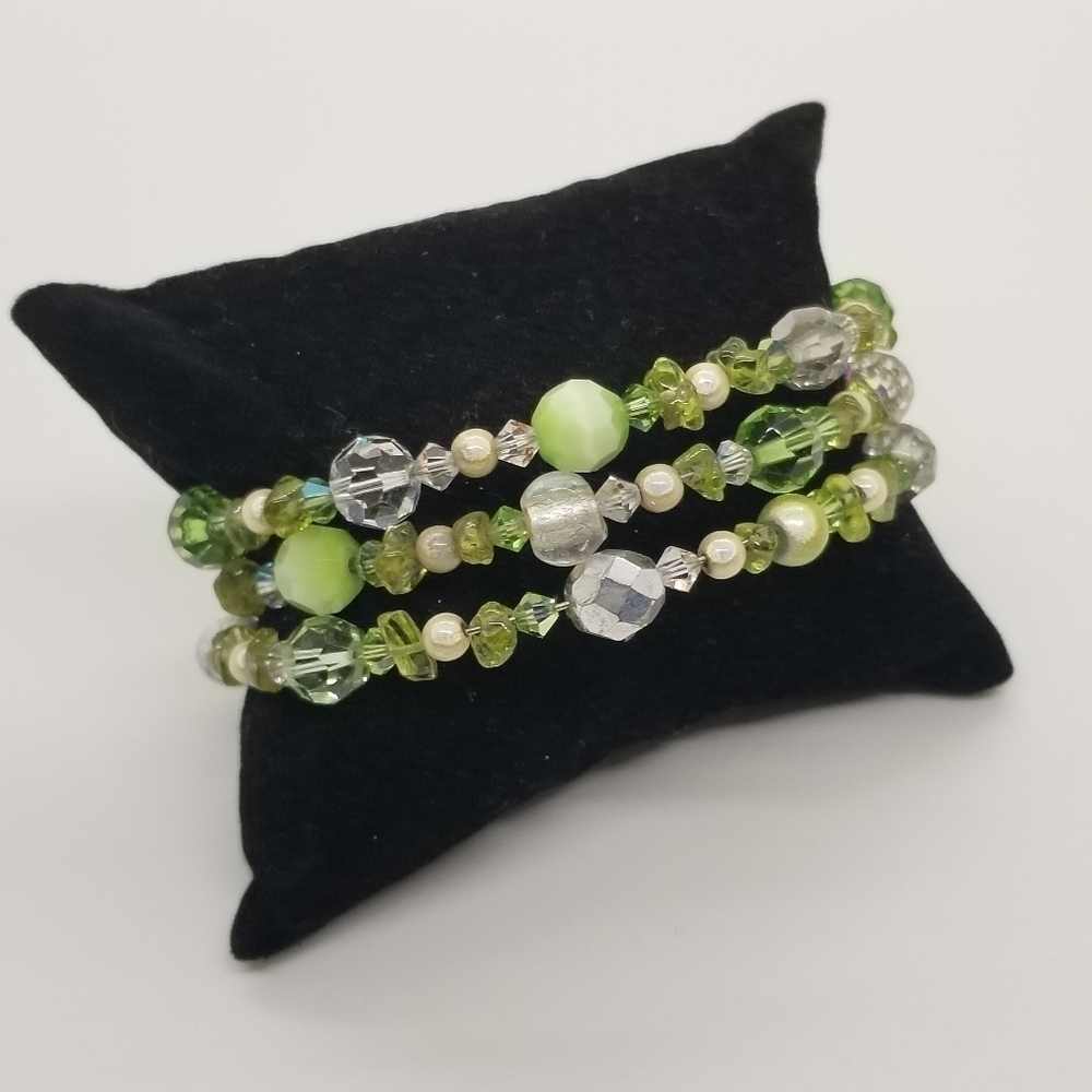 green and clear glass beaded coil bracelet